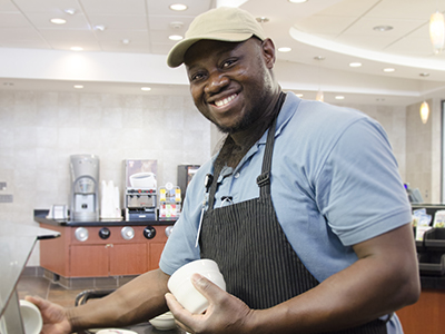 One dishwasher washes his hands 55 times a shift. JRMC's Humphrey Anku knows when he’s scraping plates and rinsing bowls, he's also protecting patients.