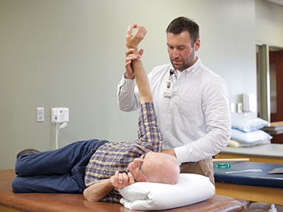 Image of Cody Champagne, a JRMC Rehabilitation Department physical therapist.