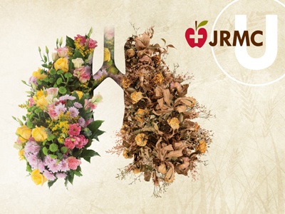 Image of thriving and dead flowers in the shape of lung.