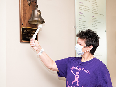 Jackie Schlenker celebrated her patient graduation at the JRMC Cancer Center after being diagnosed with breast cancer in 2018.