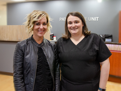 JRMC Chief Nursing Officer, Trisha Jungels (left), presents Registered Nurse, Lisa Schrenk, with the 2019 Nora Melvold Paulson Excellence in Leadership Award.