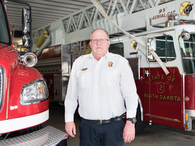 JRMC Podiatrist/Foot & Ankle Surgeon, Dr. Rachael Renschler treated Jamestown Fire Chief, Jim Reuther, for his feet.
