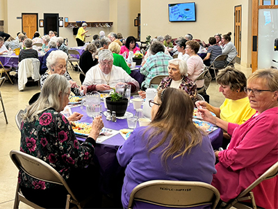 Image of JRMC Auxilians enjoying salad luncheon