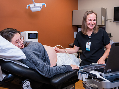 womens-health-obgyn-ultrasound Image of JRMC OB/GYN Dr. Stromquist performing an ultrasound on a patient.